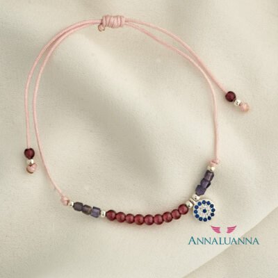 pulsera hilo rosado con iolita, granate y ojito turco